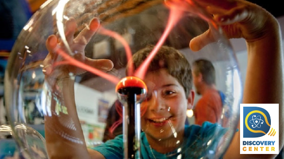 A boy peering into electrostatic global