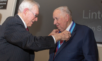 Linton Brooks receiving the medal from John S. Foster, Jr.