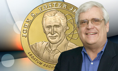 George Miller with the John S. Foster, Jr. medal in the background.