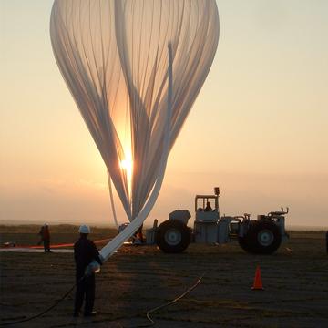 atmospheric weather balloon being prepped for release