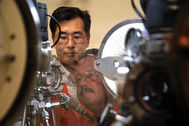 Brandon Chung and Kenneth Lema checking dilatometer setup
