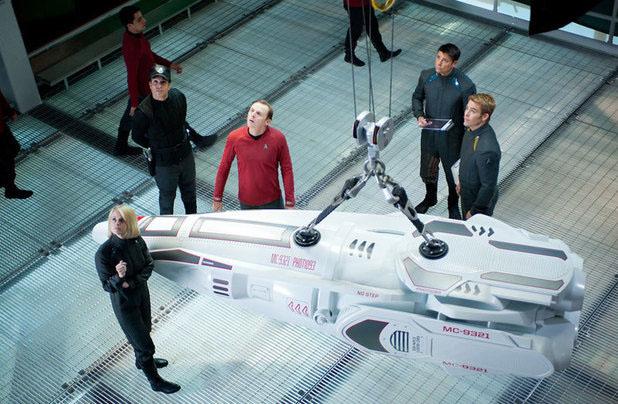 Star Trek crew members look up from the bay of the National Ignition Facility
