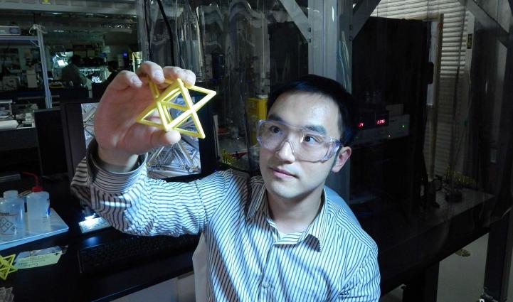 Engineer Xiaoyu "Rayne" Zheng studies a macroscale version of the unit cell
